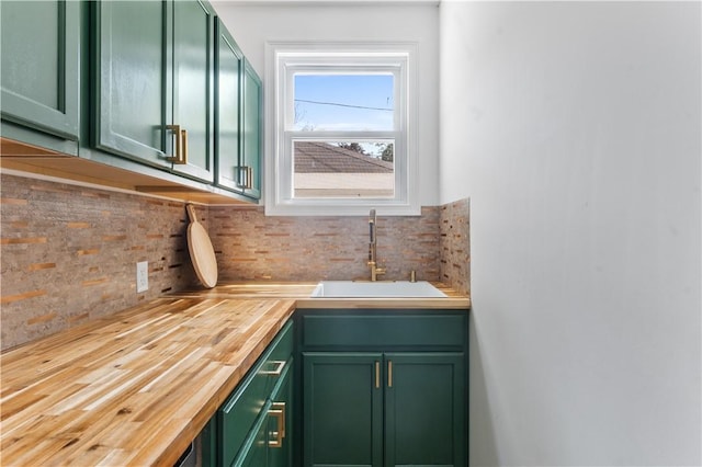 61 Wealth Ave, Providence, RI 02908 - kitchen featuring green cabinets, butcher block countertops, and decorative backsplash