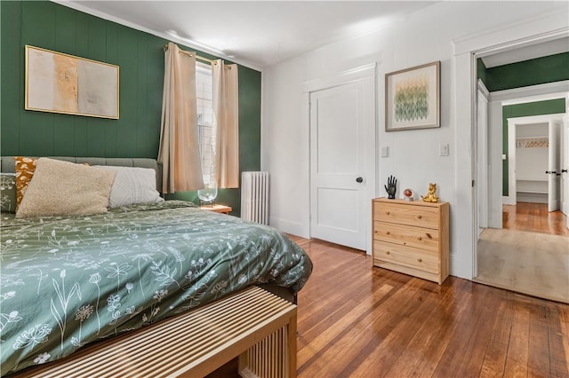 61 Wealth Ave, Providence, RI 02908 - bedroom with radiator and wood-type flooring