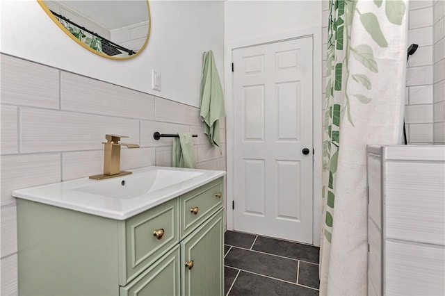 61 Wealth Ave, Providence, RI 02908 - full bath with vanity, tile patterned floors, and tile walls