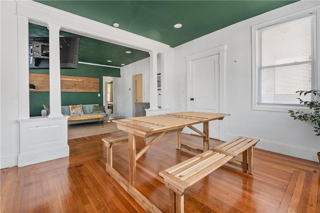 61 Wealth Ave, Providence, RI 02908 - dining room featuring ornate columns and hardwood / wood-style floors
