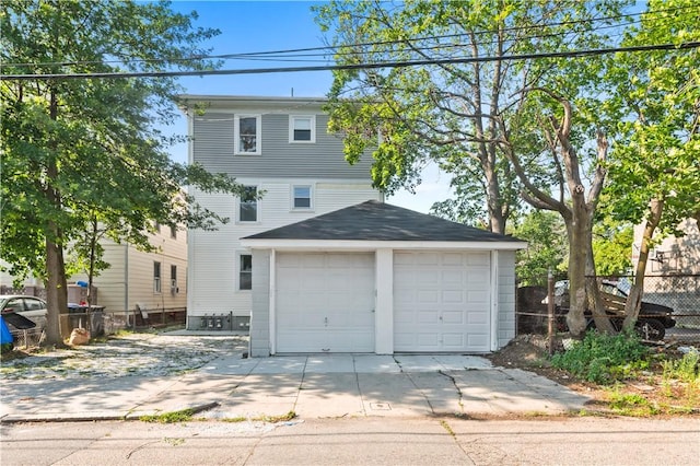 61 Wealth Ave, Providence, RI 02908 - view of front of house featuring a garage and concrete driveway