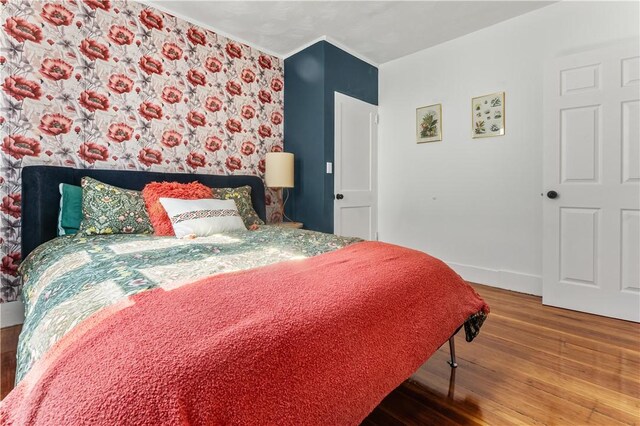 61 Wealth Ave, Providence, RI 02908 - bedroom with wood finished floors and ornamental molding