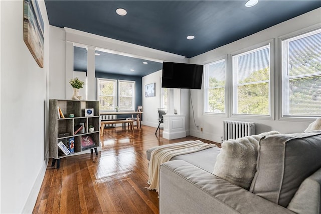 61 Wealth Ave, Providence, RI 02908 - living room with radiator heating unit, hardwood / wood-style flooring, and recessed lighting