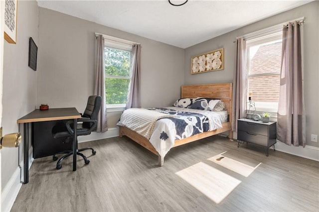 61 Wealth Ave, Providence, RI 02908 - bedroom with wood finished floors and a desk