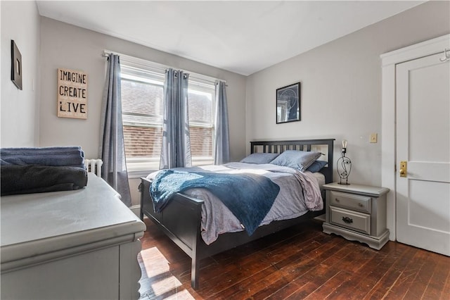 61 Wealth Ave, Providence, RI 02908 - bedroom featuring dark wood finished floors and radiator heating unit