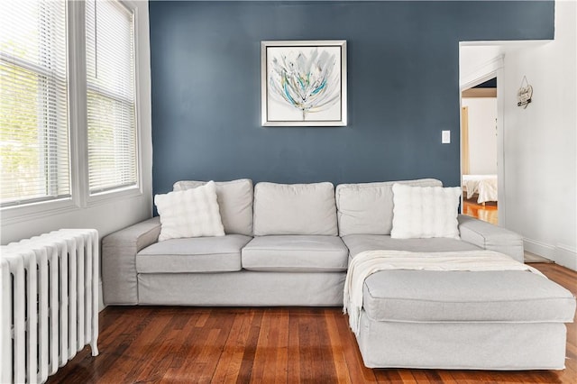 61 Wealth Ave, Providence, RI 02908 - living room with radiator heating unit and dark wood finished floors