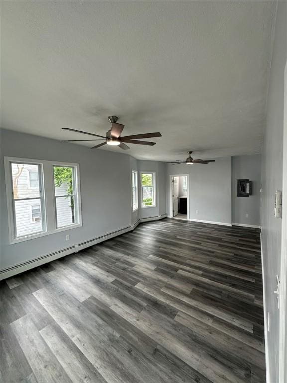 208 Carnation St, Pawtucket, RI 02860 - unfurnished living room with a ceiling fan, dark wood-style flooring, and baseboard heating