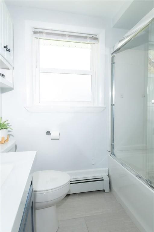 94 Osage Dr, Warwick, RI 02888 - full bath featuring vanity, enclosed tub / shower combo, healthy amount of natural light, and a baseboard radiator