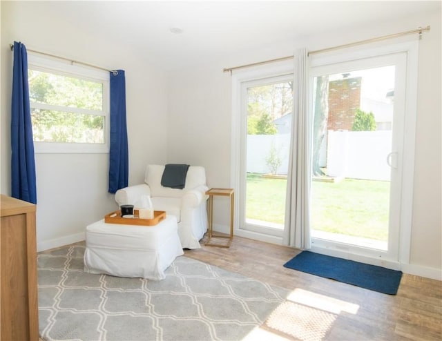 94 Osage Dr, Warwick, RI 02888 - sitting room with wood finished floors and baseboards