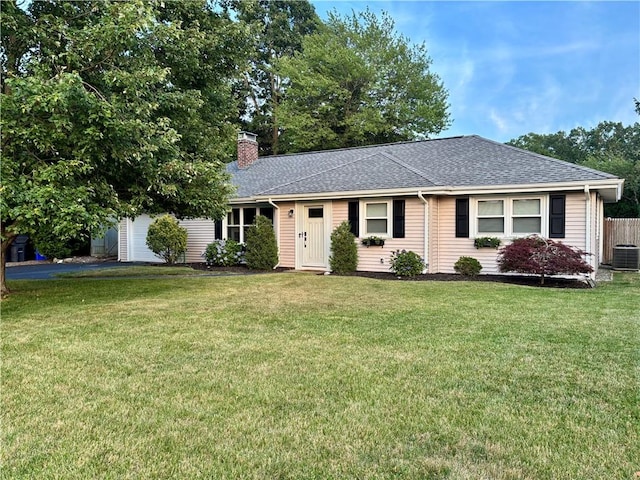 94 Osage Dr, Warwick, RI 02888 - ranch-style home with a chimney, roof with shingles, and asphalt driveway