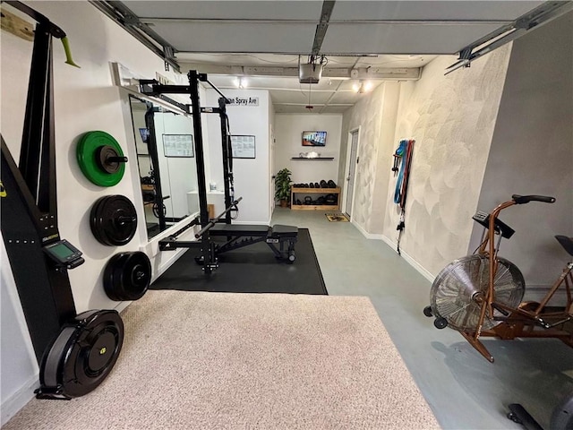 94 Osage Dr, Warwick, RI 02888 - workout room featuring a garage and baseboards
