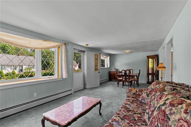 33 Limestone St, Warwick, RI 02889 - carpeted living area featuring a baseboard heating unit