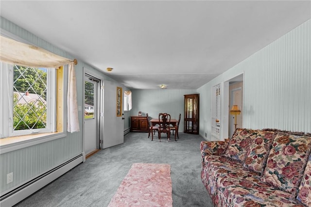 33 Limestone St, Warwick, RI 02889 - living room featuring a baseboard heating unit and carpet flooring