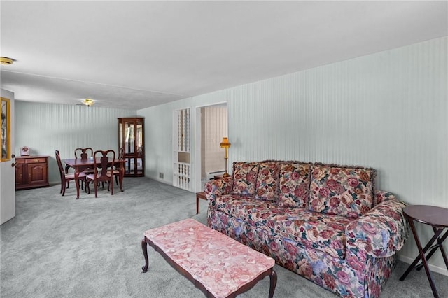 33 Limestone St, Warwick, RI 02889 - carpeted living area featuring a baseboard heating unit