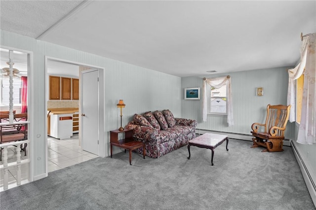 33 Limestone St, Warwick, RI 02889 - living area featuring a baseboard heating unit, light colored carpet, and light tile patterned floors