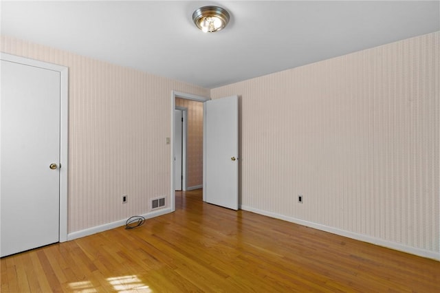 33 Limestone St, Warwick, RI 02889 - unfurnished bedroom featuring wood finished floors and baseboards