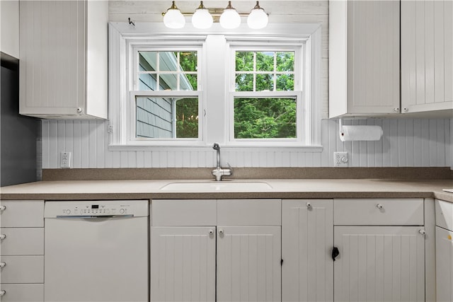 303 Washington Rd, Barrington, RI 02806 - kitchen featuring white dishwasher and white cabinets