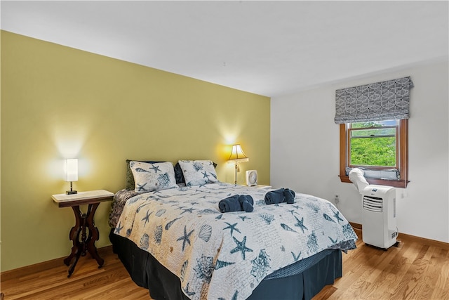 303 Washington Rd, Barrington, RI 02806 - bedroom featuring wood finished floors and baseboards
