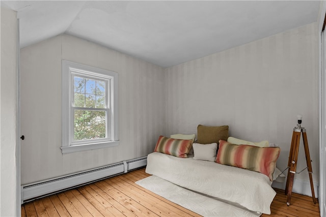 303 Washington Rd, Barrington, RI 02806 - bedroom featuring baseboard heating, hardwood / wood-style flooring, and lofted ceiling