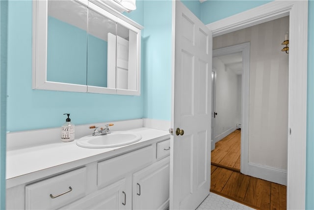 303 Washington Rd, Barrington, RI 02806 - bathroom with vanity and wood finished floors