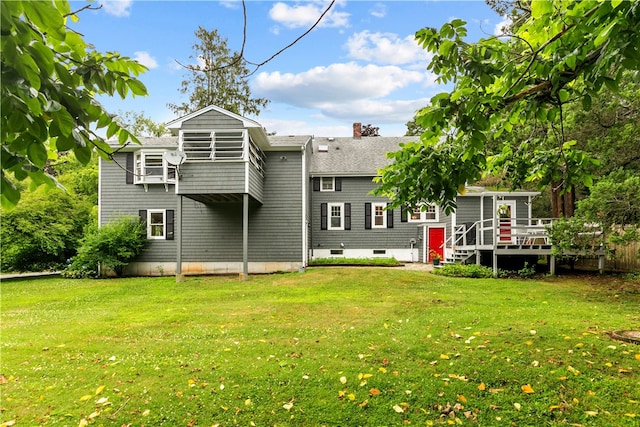 303 Washington Rd, Barrington, RI 02806 - back of property with a lawn, a shingled roof, a wooden deck, a chimney, and crawl space