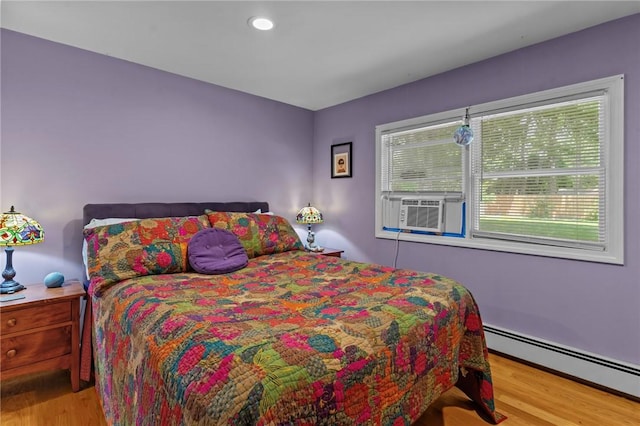 37 Ridge Rd, East Greenwich, RI 02818 - bedroom featuring a baseboard radiator, wood finished floors, cooling unit, and recessed lighting