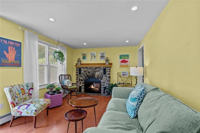 37 Ridge Rd, East Greenwich, RI 02818 - living area featuring wood finished floors, a fireplace, a baseboard radiator, and recessed lighting