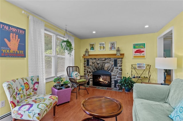 37 Ridge Rd, East Greenwich, RI 02818 - living room with wood finished floors, baseboard heating, a fireplace, and recessed lighting