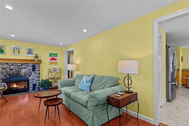37 Ridge Rd, East Greenwich, RI 02818 - living room featuring a stone fireplace and recessed lighting