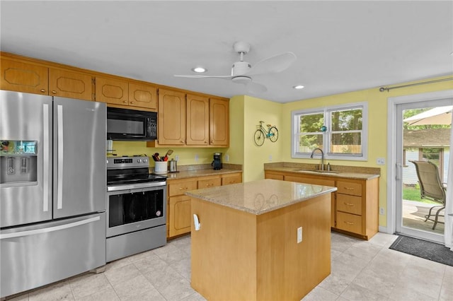 37 Ridge Rd, East Greenwich, RI 02818 - kitchen featuring stainless steel appliances, a center island, light stone countertops, recessed lighting, and light tile patterned floors