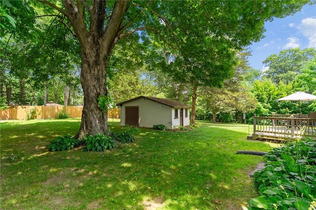 37 Ridge Rd, East Greenwich, RI 02818 - view of yard featuring a wooden deck, an outdoor structure, and view of scattered trees