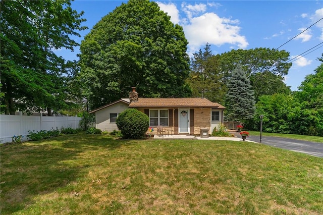 37 Ridge Rd, East Greenwich, RI 02818 - ranch-style house with covered porch and a chimney