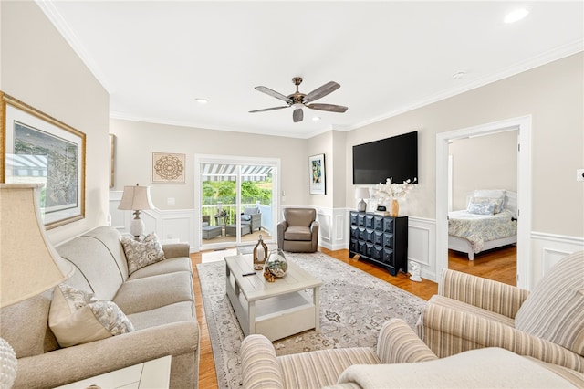 2 Sydney Rose Ct Unit B, Johnston, RI 02919 - living room with crown molding, ceiling fan, wainscoting, light wood-type flooring, and recessed lighting