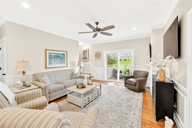 2 Sydney Rose Ct Unit B, Johnston, RI 02919 - living area with crown molding, light wood-style floors, ceiling fan, a wainscoted wall, and recessed lighting