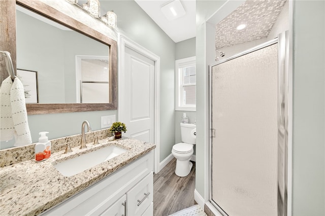 2 Sydney Rose Ct Unit B, Johnston, RI 02919 - bathroom featuring wood finished floors, a shower stall, and vanity