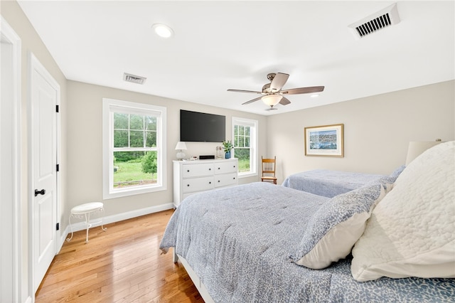 2 Sydney Rose Ct Unit B, Johnston, RI 02919 - bedroom with light wood finished floors, ceiling fan, and recessed lighting