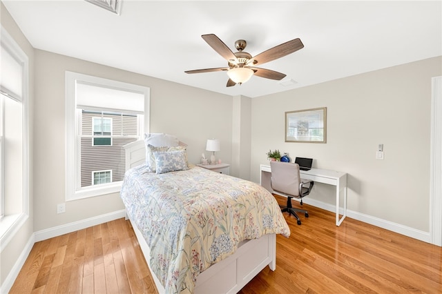 2 Sydney Rose Ct Unit B, Johnston, RI 02919 - bedroom with light wood-type flooring, a desk, and a ceiling fan