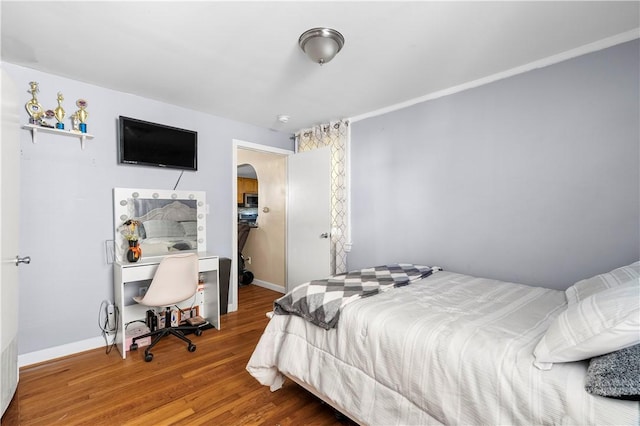 7 Snell Ct, West Warwick, RI 02893 - bedroom featuring wood finished floors and arched walkways