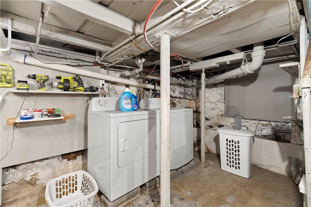 7 Snell Ct, West Warwick, RI 02893 - unfinished below grade area featuring washing machine and dryer