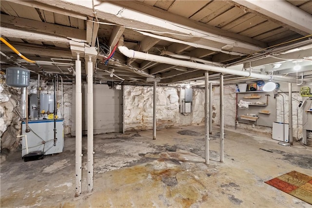 7 Snell Ct, West Warwick, RI 02893 - unfinished below grade area featuring water heater and a heating unit