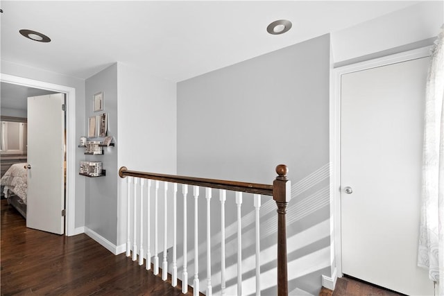 7 Snell Ct, West Warwick, RI 02893 - staircase with wood finished floors and baseboards