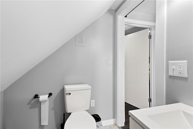 7 Snell Ct, West Warwick, RI 02893 - bathroom with vanity and vaulted ceiling