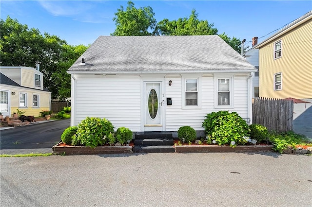7 Snell Ct, West Warwick, RI 02893 - new england style home with entry steps and roof with shingles