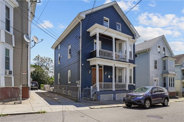 19 Covell St, Providence, RI 02909 - view of front of property featuring a balcony, a porch, and cooling unit