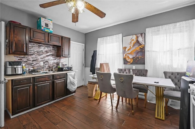 19 Covell St, Providence, RI 02909 - kitchen featuring light countertops, ceiling fan, backsplash, dark wood-type flooring, and dark brown cabinetry