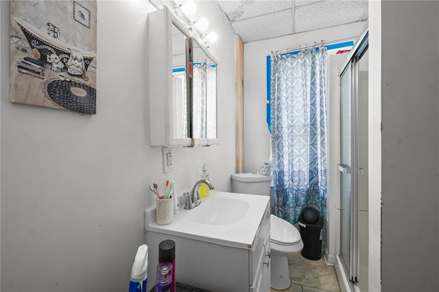 19 Covell St, Providence, RI 02909 - bathroom with a stall shower, vanity, a drop ceiling, and tile patterned flooring