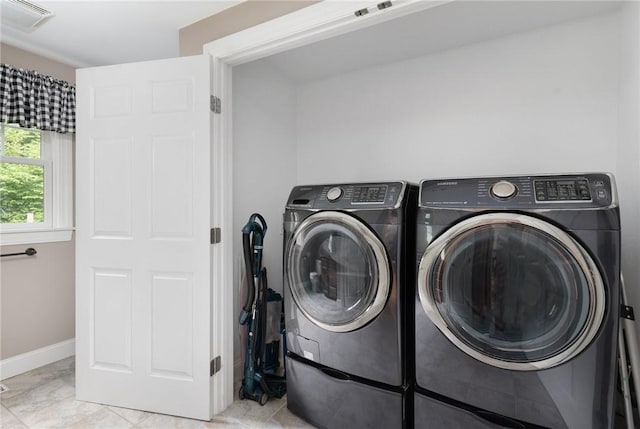 219 Fenner Hill Rd, Hopkinton, RI 02832 - laundry area featuring washer and clothes dryer and baseboards