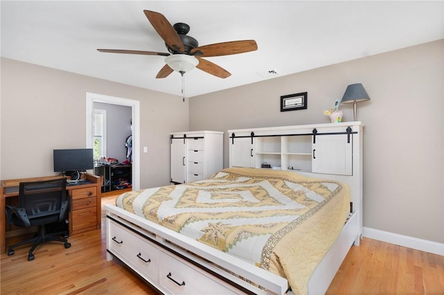 219 Fenner Hill Rd, Hopkinton, RI 02832 - bedroom with light wood-style flooring, an office area, and ceiling fan