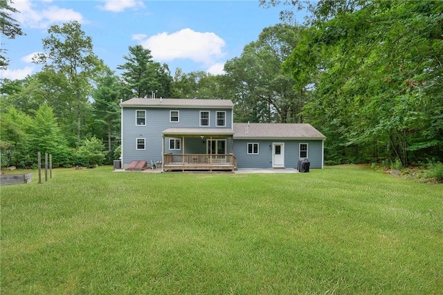 219 Fenner Hill Rd, Hopkinton, RI 02832 - rear view of house with a wooden deck, a yard, and a patio