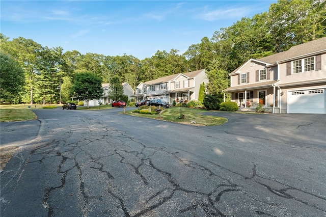 18 Country Hill Ln, Smithfield, RI 02917 - view of street featuring a residential view and view of wooded area